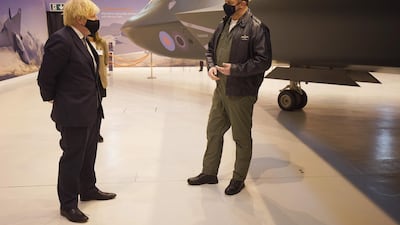 Britain's prime minister Boris Johnson is shown around the Team Tempest facility during a visit to BAE Systems at Warton Aerodrome in Preston, northwest England. AFP