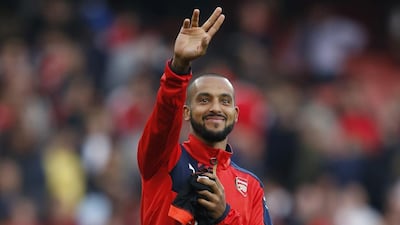 Theo Walcott acknowledges supporters after his team's win over Manchester United in the Premier League last weekend. Carl Recine / Action Images / Reuters / October 4, 2015