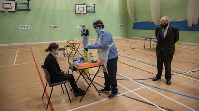 The gym is used as a makeshift testing centre for the students. Reuters