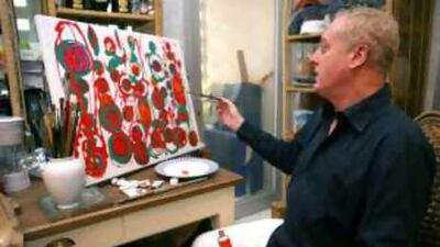 Tony Sexton works on an abstract piece in his kitchen.