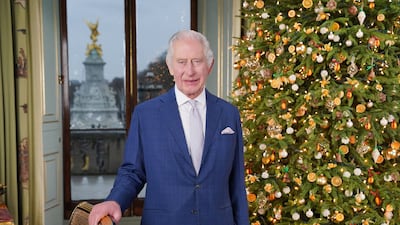 King Charles III during the recording of his Christmas message at Buckingham Palace. PA