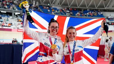 Gold medalists Laura Kenny, right, and Katie Archibald of Great Britain pose with their medals after the women's madison final. EPA