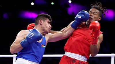 Zeyad Ishaish, left, and Sewon Okazawa of Team Japan. Getty Images