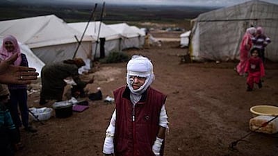 A reader says Syrian people need more than sympathy and aid from the global community. Muhammed Muheisen / AP Photo