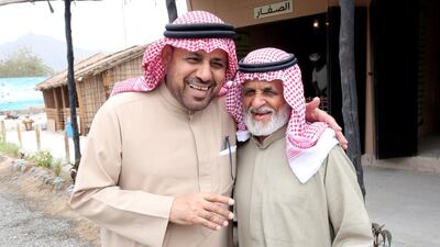 Ali Al Abduli, left, manager of the Fujairah Welfare Association, with Abdullah Al Ali, a fisherman. Courtesy Fujairah Welfare Association