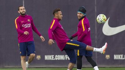 FC Barcelona’s players Alexis Vidal (L), Brazilian Neymar (C) and Jordi Alba (R) react during the team’s training session held at Joan Gamper Sports City in Sant Joan Despi, Catalonia, Spain, 01 April 2016. FC Barcelona will face Real Madrid in a Spanish La Liga ‘Clasico’ football match the upcoming 02 April. EPA/QUIQUE GARCIA