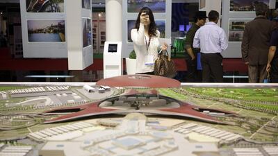 A model of Ferrari World and Yas Mall on display at Cityscape in Abu Dhabi last year. Sammy Dallal / The National