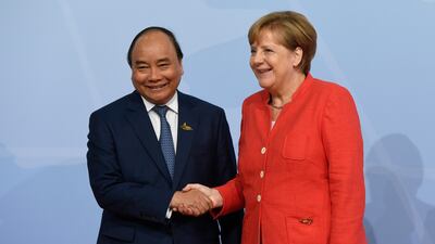 German Chancellor Angela Merkel welcomes Vietnam's Prime Minister Nguyen Xuan Phuc. AFP Photo