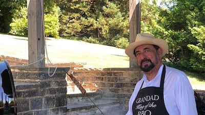 Sheikh Sultan bin Mohammed Al Qasimi, Ruler of Sharjah, poses alongside a barbecue while celebrating his birthday. Sheikha Bodour bint Sultan Al Qasimi / Instagram
