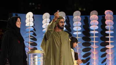 Sheikh Mohammed bin Rashid, Vice President and Ruler of Dubai, reveals the new logo. Anna Nielsen / The National