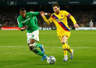 Barcelona attascker Lionel Messi, right, assisted in all three of his side's goals against Real Betis last week. Reuters