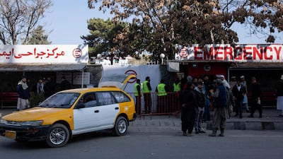 People wait outside Kabul's Emergency Hopsital in Share-Naw where at least 30 injured have been brought. Stefanie Glinski for The National
