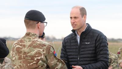 Prince William meets members of the British Armed Forces in Rzeszow to hear about the work the troops have been doing with Polish soldiers. Getty
