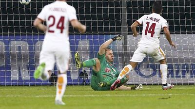 AS Roma’s Iago Falque scores their fourth goal against Bayer Leverkusen on Tuesday night in the Champions League contest at the BayArena. Wolfgang Rattay / Reuters