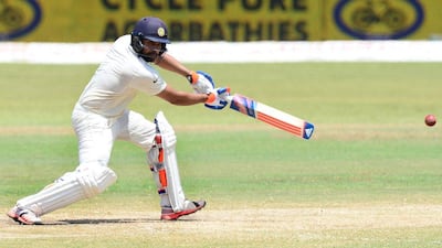 India cricketer Rohit Sharma plays a shot during the fourth day of the third and final Test against Sri Lanka on Monday in Colombo. Lakruwan Wanniarachchi / AFP / August 31, 2015