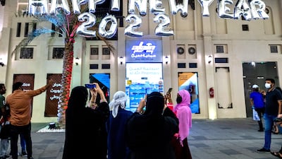 Visitors enjoy the evening at Sheikh Zayed Heritage Festival. Victor Besa / The National