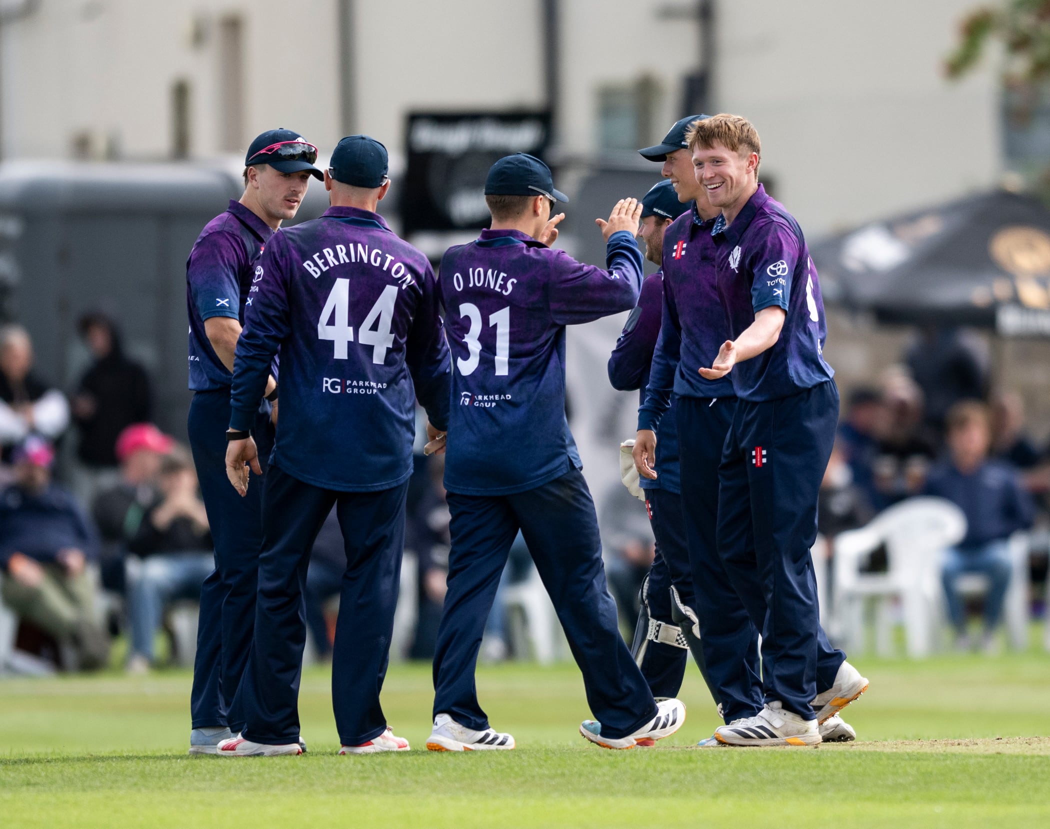 Scotland celebrate their one-wicket victory over UAE.