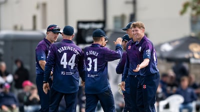 Scotland celebrate their one-wicket victory over UAE.