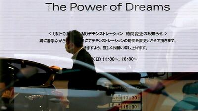 Japanese automaker Honda has revised forecasts for its full-year net profit. AP