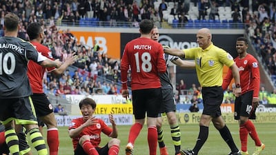 Right midfield: Kim Bo-Kyung, Cardiff City. Conceded a penalty needlessly against Stoke. Rebecca Naden / Reuters
