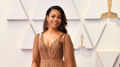 Regina Hall, wearing a dusty-brown gown. AFP