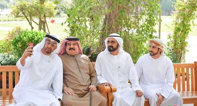 Sheikh Mohamed bin Zayed captures the moment during his visit to Love Lake with the king of Bahrain and Sheikh Mohammed bin Rashid and Sheikh Hamdan bin Mohammed.