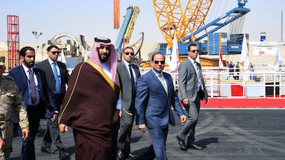 Saudi Crown Prince Mohammad Bin Salman and Egyptian President Abdel Fattah El Sisi visit the Suez Canal at the city of Ismailia on March 5, 2018. Egyptian Presidency handout / EPA