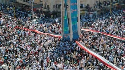 Protesters demonstrate against the Syrian government in July 2011. Regime and rebels alike have used the flag to powerful effect. AFP
