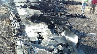 Debris from crashed the Russian jet lies strewn across the sand at the site of the crash in Sinai, Egypt. EPA