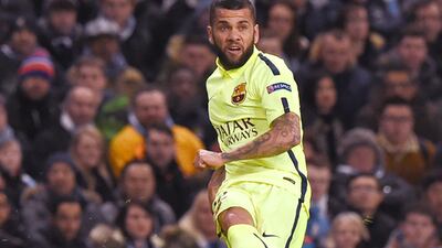 Barca’s Dani Alves has not spoken publicly about his contract since November as his future at Camp Nou is up in the air. Paul Ellis / AFP