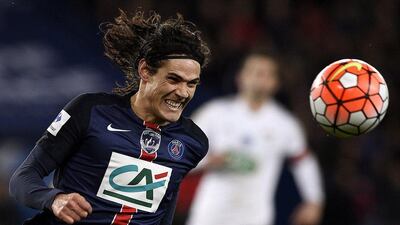 Paris Saint-Germain's Edinson Cavani runs for the ball during the French Cup Round of 16 match between Paris Saint-Germain and Lyon on February 10, 2016, at the Parc des Princes stadium in Paris. AFP PHOTO / FRANCK FIFE
