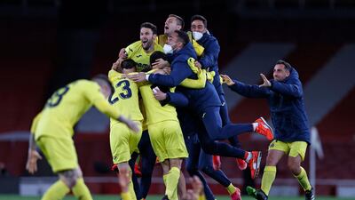Villarreal players celebrate after the Uefa Europa League semi-final, second leg football match between Arsenal and Villarreal at the Emirates Stadium in London. Villareal advanced to the final. AFP