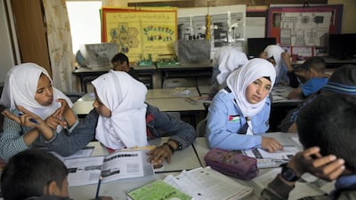 Bedouin children studying Science in the elementary school in Khan Al Ahmar on May 2, 2018. Photo by Heidi Levine / The National