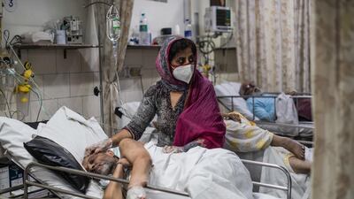 Covid-19 patients in the emergency ward at the Holy Family hospital. Getty