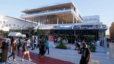 People visit the France pavilion. AFP