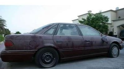 An abandoned car in Dubai's Springs Village.