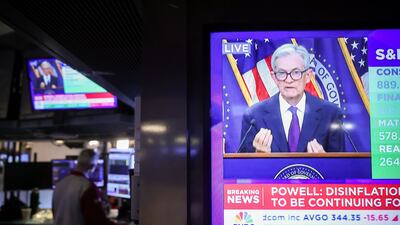 A television station on the floor of the New York Stock Exchange broadcasts Fed Chairman Jerome Powell speaking at a press conference. Bloomberg