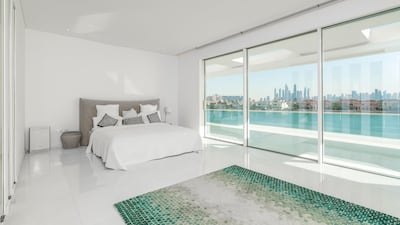 A hint of green adds some flavour to another white room