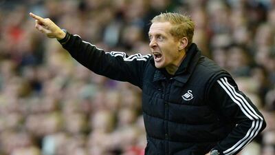 Swansea City have rewarded manager Garry Monk for keeping the side in the Premier League by naming him as their permanent manager on a three-year deal, the club said on May 7, 2014. EPA/PETER POWELL