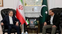 Pakistan Army chief Field Marshal Asim Munir, right, talks to Iranian Foreign Minister Abbas Araghchi during a meeting in Islamabad. EPA