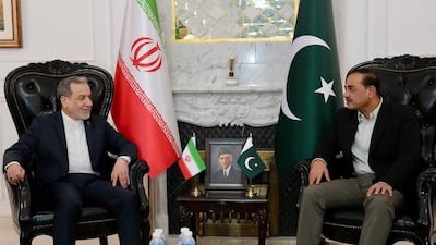 Pakistan Army chief Field Marshal Asim Munir talks to Iranian Foreign Minister Abbas Araghchi during a meeting in Islamabad. EPA