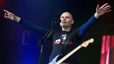 Billy Corgan of the band Smashing Pumpkins has long been a fan of wrestling. Andrew Cowie / AFP