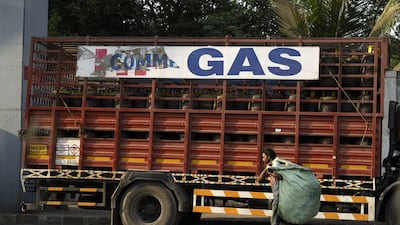 A gas delivery lorry is loaded at Bharat Petroleum oil refinery in Mumbai. If the Strait of Hormuz closure persists, India's industrial consumers will have to seek alternative fuels. Bloomberg