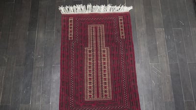 Afghan Qawdani prayer rug woven in Herat province. Antonie Robertson / The National
