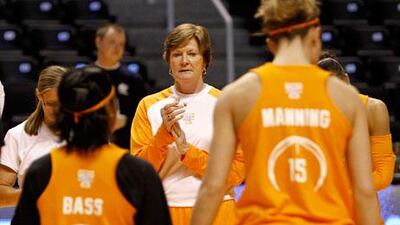 Pat Summitt, centre, the University of Tennessee's women's basketball coach, knew something was wrong when, during a time out she had called, she forgot what offensive set she wanted to the team to play.