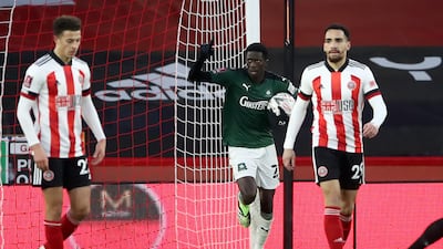 Plymouth's Panutche Camara celebrates scoring. PA