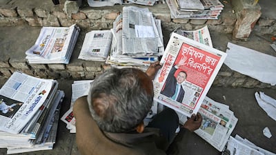 Bangladesh Nationalist Party chairman Tarique Rahman is shown on the front page of a newspaper as the country goes to the polls. AFP