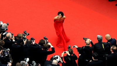 French model and designer Ines de la Fressange poses as she arrives for the screening of the film "Young and Beautiful". Olivier Anrigo / AFP
