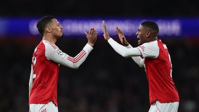 William Saliba, left, and Cristhian Mosquera of Arsenal celebrate at full-time following the team's 0-0 draw against Sporting Lisbon. Getty Images