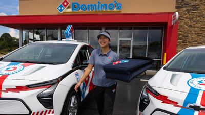 More than 100 Domino's branded Chevy Bolt EVs are already on the road.